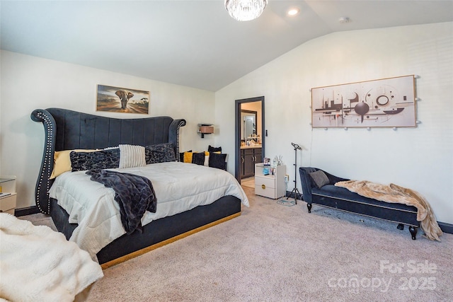 154 Tanner Loop, Troutman, NC 28166 - bedroom with lofted ceiling, carpet, and ensuite bathroom
