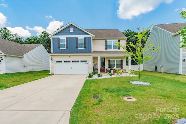154 Tanner Loop, Troutman, NC 28166 - view of front of home with board and batten siding, concrete driveway, an attached garage, a porch, and a front lawn