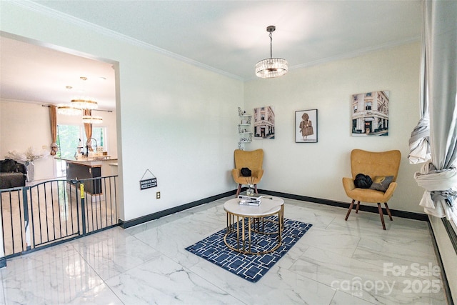 154 Tanner Loop, Troutman, NC 28166 - sitting room featuring a chandelier, ornamental molding, and marble look tiles