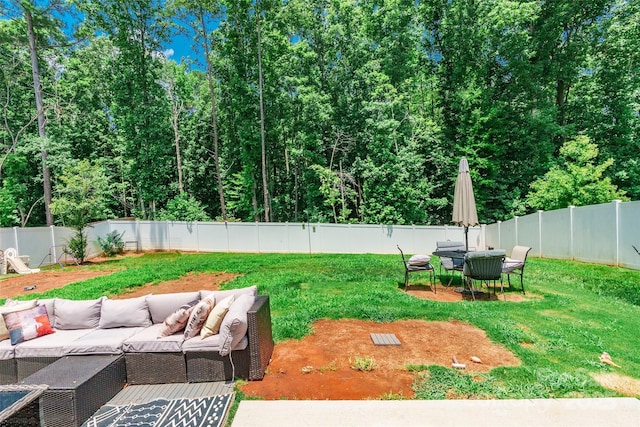 154 Tanner Loop, Troutman, NC 28166 - fenced backyard featuring outdoor lounge area