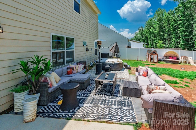 154 Tanner Loop, Troutman, NC 28166 - fenced backyard with an outdoor hangout area
