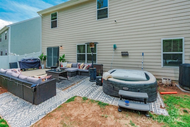 154 Tanner Loop, Troutman, NC 28166 - back of house with an outdoor hangout area and a patio area