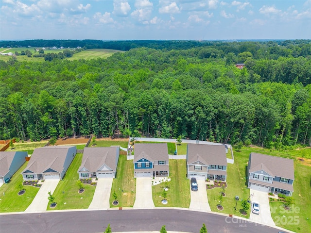 154 Tanner Loop, Troutman, NC 28166 - aerial view of residential area with a heavily wooded area