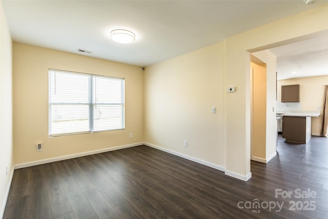 2357 Riding Trail Rd, Gastonia, NC 28054 - unfurnished room featuring dark wood-style floors and baseboards