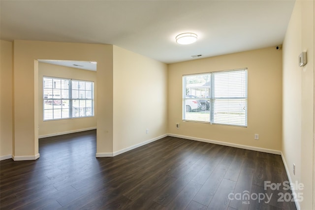 2357 Riding Trail Rd, Gastonia, NC 28054 - unfurnished room featuring healthy amount of natural light and dark wood-type flooring