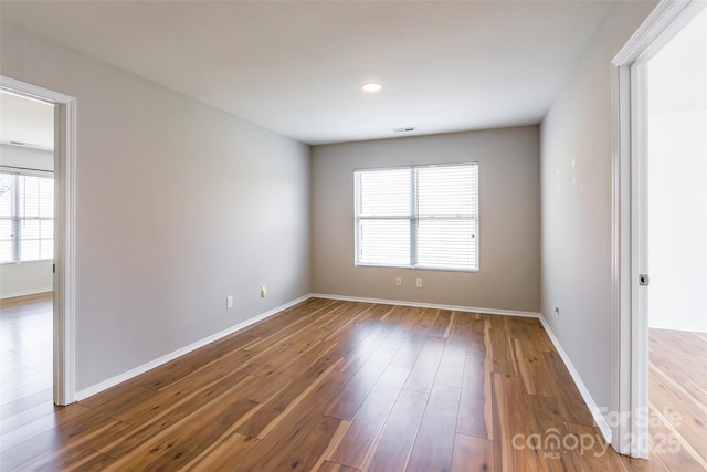 2357 Riding Trail Rd, Gastonia, NC 28054 - spare room with healthy amount of natural light and wood finished floors