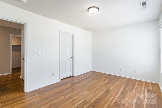 2357 Riding Trail Rd, Gastonia, NC 28054 - unfurnished bedroom with light wood finished floors and baseboards