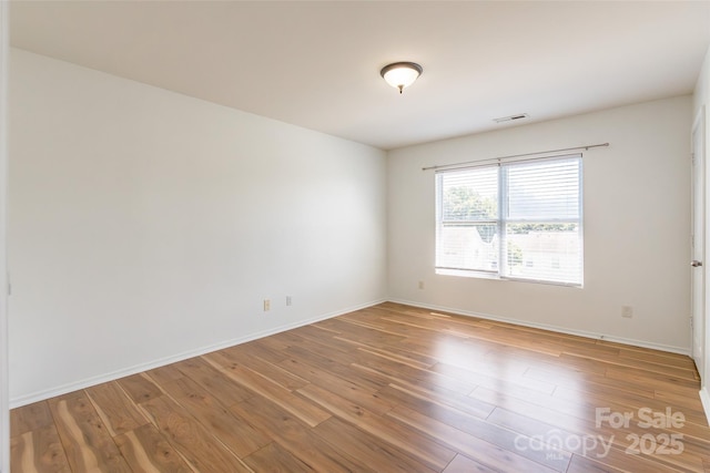 2357 Riding Trail Rd, Gastonia, NC 28054 - empty room with light wood-type flooring and baseboards