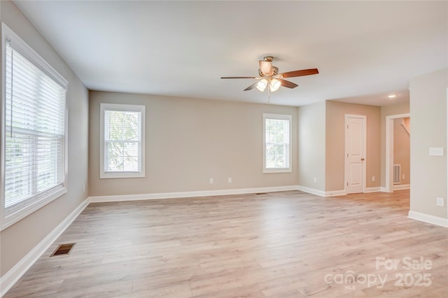 206 N Kayla Dr, Salisbury, NC 28146 - empty room featuring plenty of natural light, light wood-type flooring, and ceiling fan