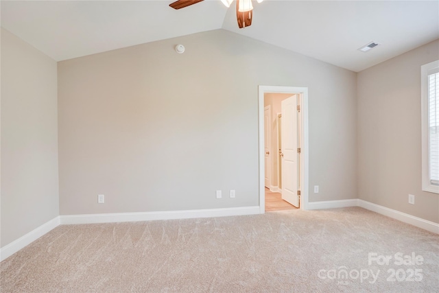 206 N Kayla Dr, Salisbury, NC 28146 - spare room featuring a ceiling fan, light colored carpet, lofted ceiling, and a smoke detector
