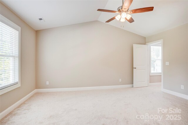 206 N Kayla Dr, Salisbury, NC 28146 - empty room featuring a ceiling fan, lofted ceiling, and light carpet