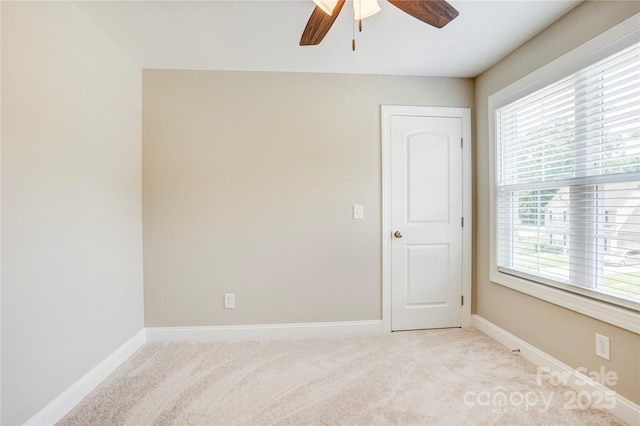206 N Kayla Dr, Salisbury, NC 28146 - empty room featuring a ceiling fan, plenty of natural light, and light colored carpet