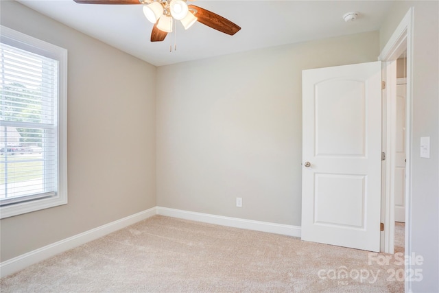 206 N Kayla Dr, Salisbury, NC 28146 - unfurnished room with light colored carpet, a smoke detector, and a ceiling fan