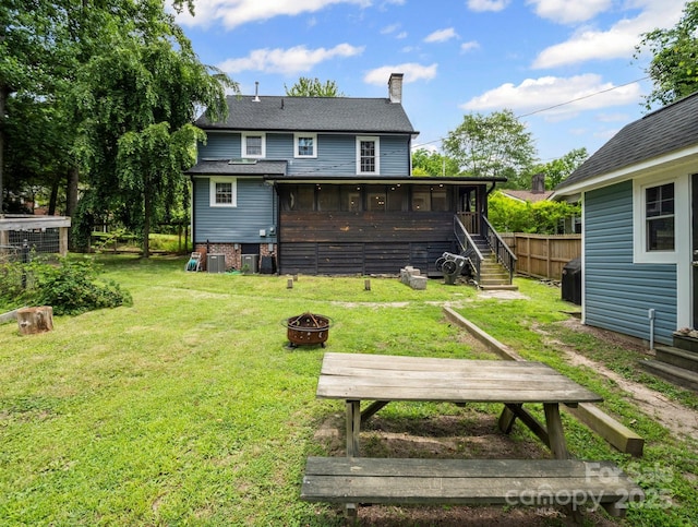 321 Ehringhaus St, Hendersonville, NC 28739 - back of house with an outdoor fire pit, a chimney, stairs, and a wooden deck
