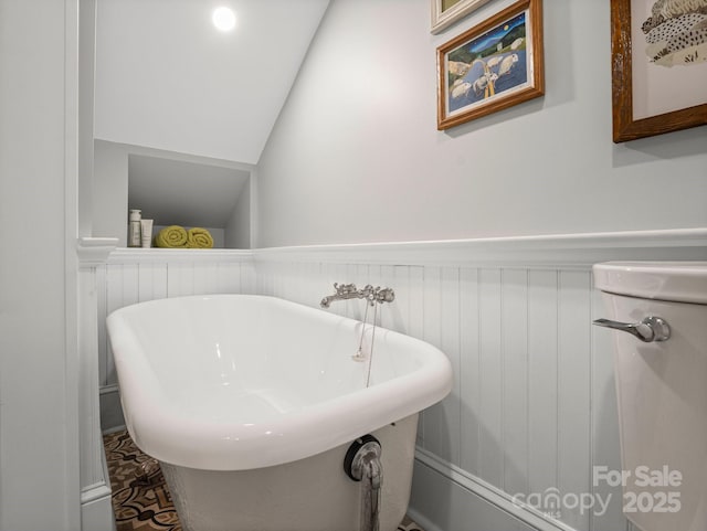 321 Ehringhaus St, Hendersonville, NC 28739 - bathroom with a soaking tub and wainscoting