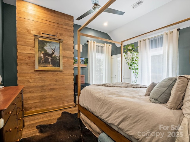 321 Ehringhaus St, Hendersonville, NC 28739 - bedroom featuring lofted ceiling, wood finished floors, and a ceiling fan