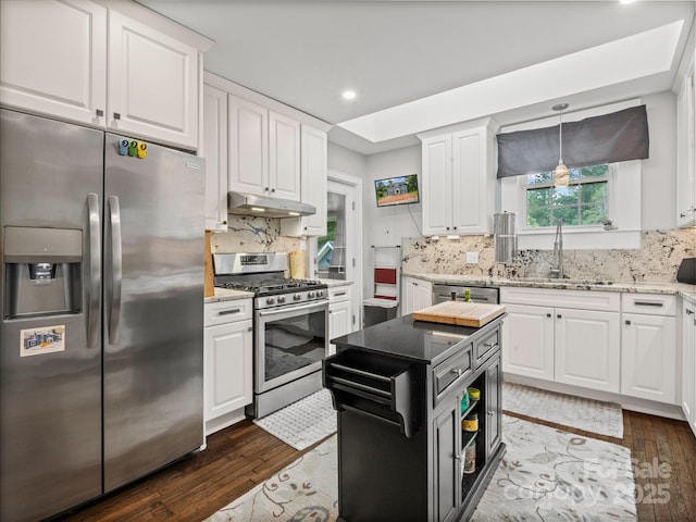 321 Ehringhaus St, Hendersonville, NC 28739 - kitchen with appliances with stainless steel finishes, under cabinet range hood, white cabinetry, and recessed lighting