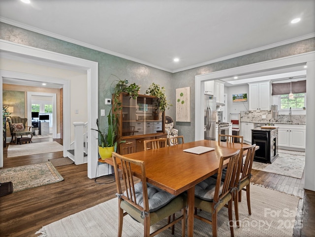 321 Ehringhaus St, Hendersonville, NC 28739 - dining space with wood finished floors, crown molding, and recessed lighting