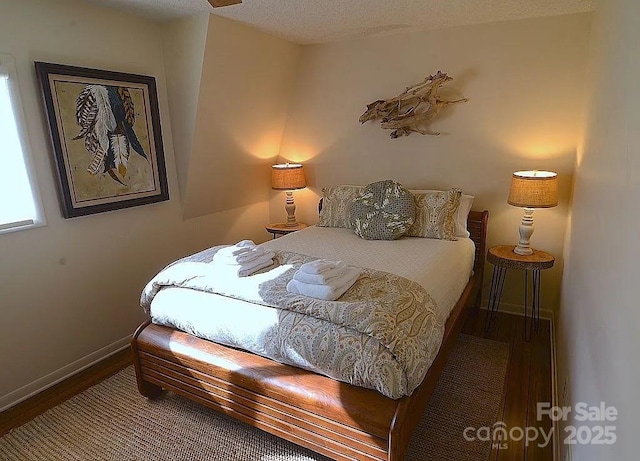 617 Norton Fork Rd, Hot Springs, NC 28743 - bedroom featuring wood finished floors