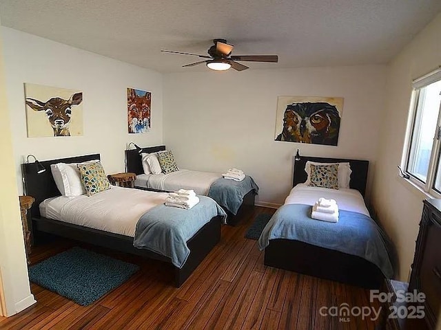 617 Norton Fork Rd, Hot Springs, NC 28743 - bedroom with wood finished floors and a ceiling fan