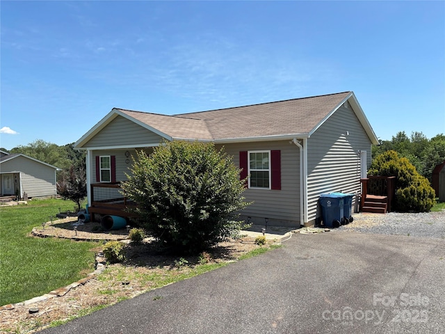 72 Helens Way, Taylorsville, NC 28681 - view of front facade featuring a front lawn and roof with shingles