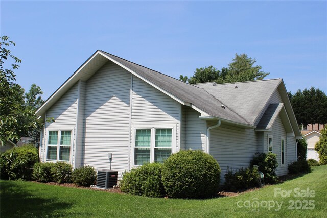 4 Gatehouse Ct, Asheville, NC 28803 - view of side of home with a lawn and a shingled roof