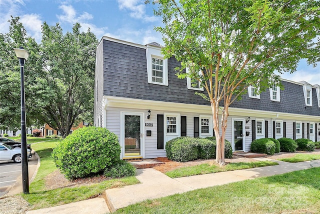 8062 Knights Bridge Rd, Charlotte, NC 28210 - view of front of home with a shingled roof and a front yard