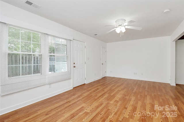 8062 Knights Bridge Rd, Charlotte, NC 28210 - empty room featuring a smoke detector, ceiling fan, and light wood finished floors