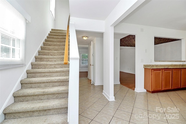 8062 Knights Bridge Rd, Charlotte, NC 28210 - stairway featuring tile patterned floors and healthy amount of natural light
