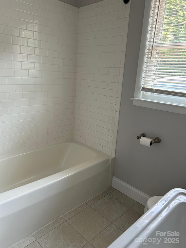 615 Marietta St, Asheville, NC 28803 - bathroom featuring tile patterned floors and bathtub / shower combination