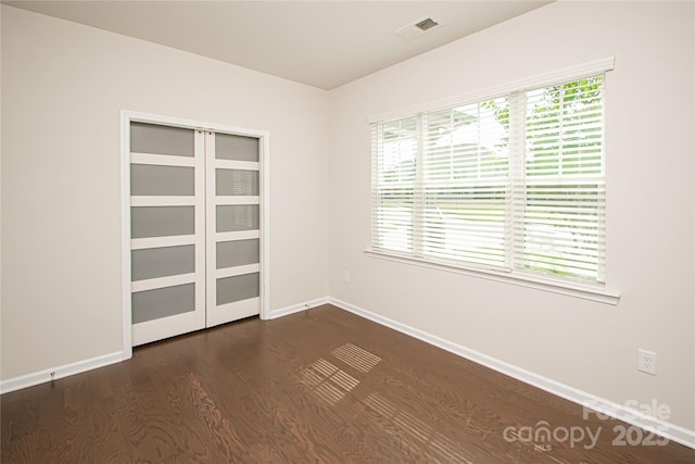 17718 Terryglass Ln, Charlotte, NC 28278 - unfurnished room featuring dark wood-style floors and healthy amount of natural light