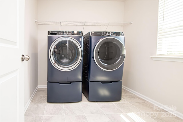 17718 Terryglass Ln, Charlotte, NC 28278 - laundry area featuring independent washer and dryer and light tile patterned floors