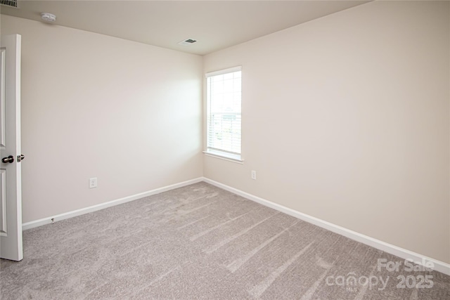 17718 Terryglass Ln, Charlotte, NC 28278 - spare room featuring carpet flooring and a smoke detector