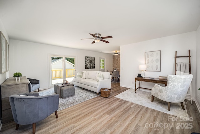 3427 Wonderland Dr, Matthews, NC 28104 - living room with wood finished floors and ceiling fan