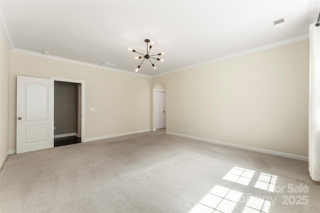 2525 Surveyor General Dr, Waxhaw, NC 28173 - carpeted spare room featuring ornamental molding, arched walkways, and a chandelier