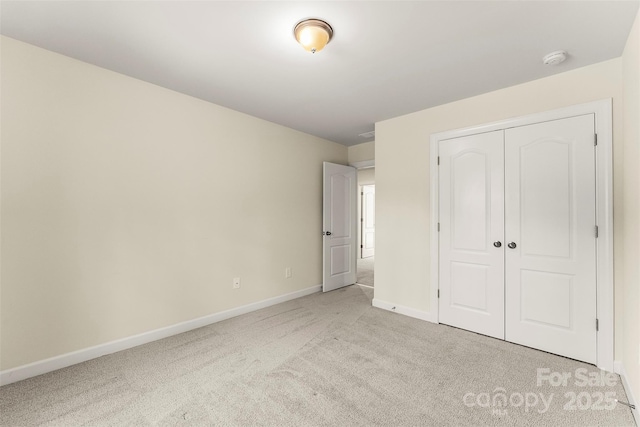 2525 Surveyor General Dr, Waxhaw, NC 28173 - unfurnished bedroom featuring carpet and a closet