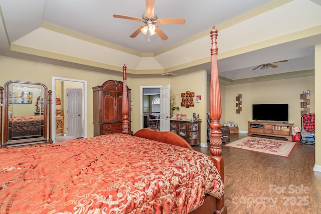 10812 Clark St, Davidson, NC 28036 - bedroom with a raised ceiling, wood finished floors, and ceiling fan