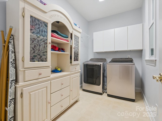 13101 Kensworth Ct, Charlotte, NC 28277 - laundry room with independent washer and dryer, cabinet space, and light flooring