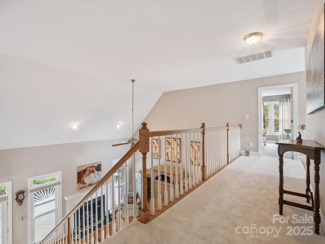 13101 Kensworth Ct, Charlotte, NC 28277 - hall featuring plenty of natural light, lofted ceiling, carpet floors, and an upstairs landing