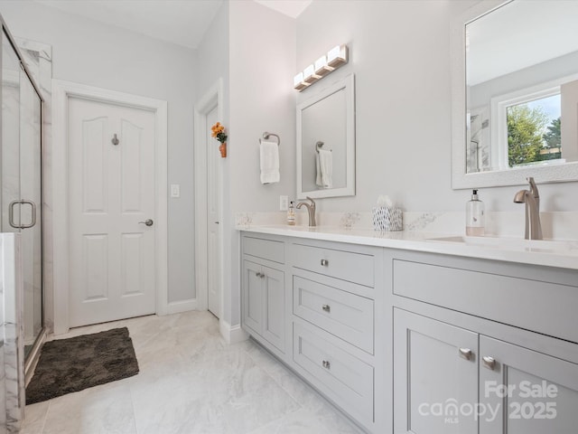 13101 Kensworth Ct, Charlotte, NC 28277 - full bath with double vanity, a shower stall, and marble finish flooring