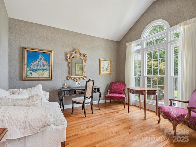 13101 Kensworth Ct, Charlotte, NC 28277 - living area featuring wood finished floors and high vaulted ceiling