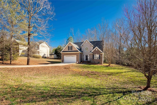 4114 Flint Dr, Lancaster, SC 29720 - traditional-style home featuring brick siding, driveway, a front yard, and an attached garage