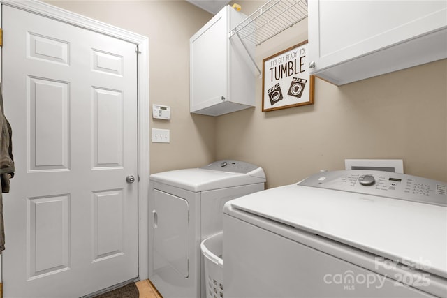4114 Flint Dr, Lancaster, SC 29720 - laundry area with cabinet space and washer and clothes dryer