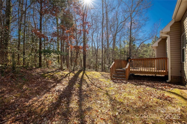 4114 Flint Dr, Lancaster, SC 29720 - view of yard featuring a deck and a forest view