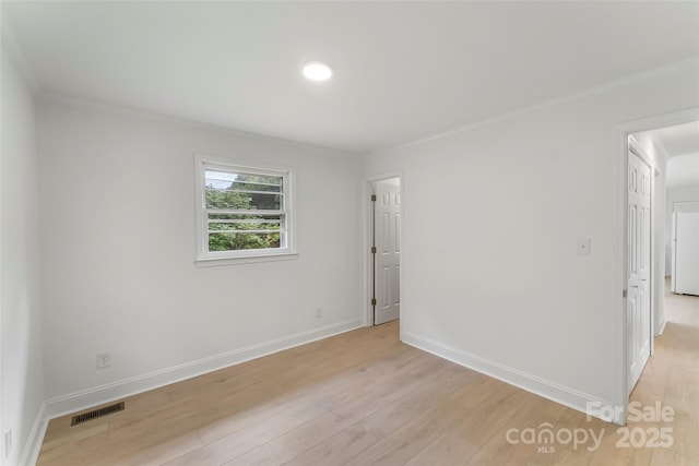 4146 Old State Rd, Newton, NC 28658 - unfurnished bedroom with light wood finished floors and crown molding