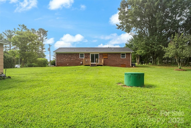 4146 Old State Rd, Newton, NC 28658 - rear view of property with brick siding and a yard