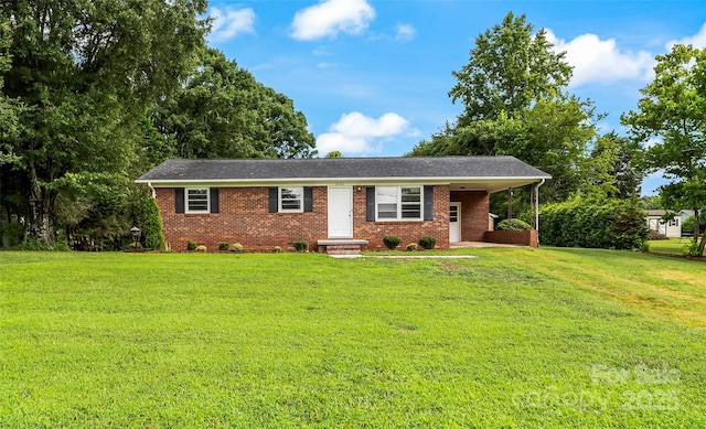 4146 Old State Rd, Newton, NC 28658 - ranch-style home with brick siding, a front yard, and a carport