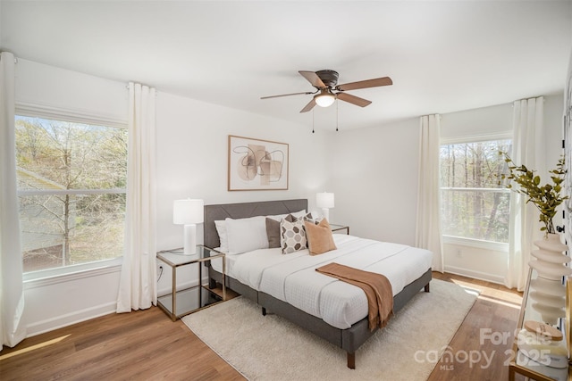 8025 Cliffside Dr, Charlotte, NC 28270 - bedroom with light wood-style floors and ceiling fan