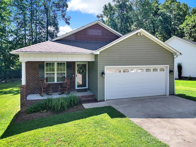 224 Eagle Creek Rd, Clover, SC 29710 - view of front of home featuring roof with shingles, an attached garage, a porch, concrete driveway, and a front lawn
