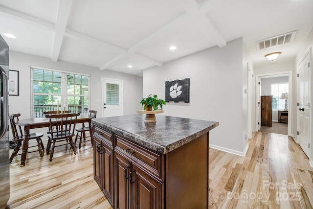224 Eagle Creek Rd, Clover, SC 29710 - kitchen featuring dark countertops, light wood-type flooring, beamed ceiling, plenty of natural light, and recessed lighting